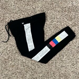 PINK Victoria’s Secret size L yoga pants with logo down sides and faux tie